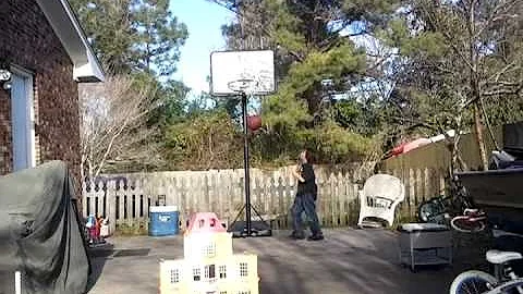 Trey hoskins playing basketball