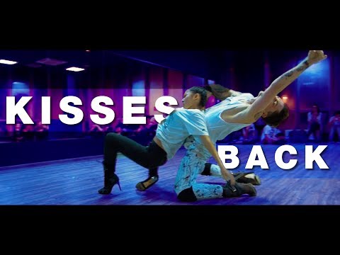 KISSES BACK