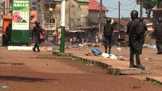 Guinea police and protesters clash in opposition stronghold in capital | AFP