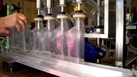 Four head semi-automatic bench top overflow filling machine