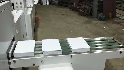 A4 copy paper sheeting machine with transmit conveyor collector.