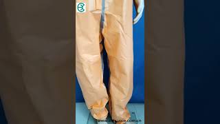 Orange micrporous coverall with gray taped seam.