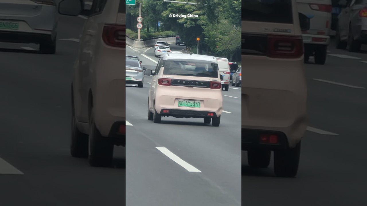 Pink Wuling Hongguang Mini EV on the Road