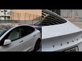 Coloquei películas de vidro escurecidas e emblemas preto no Tesla Model 3