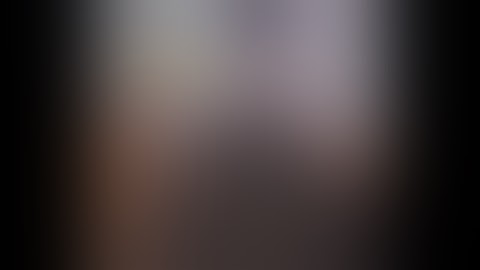 Trying to stand on a very high stack of crates