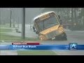 Portsmouth school bus stranded in flooded street