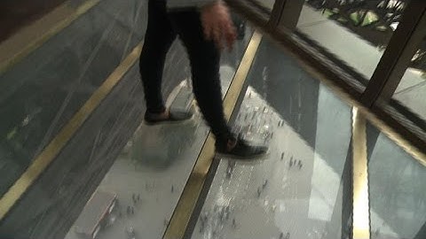 Eiffel Tower dazzles and gives chills with new glass floor