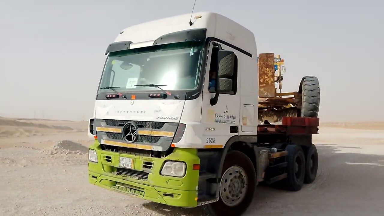 grader, singal drum roller load in loadbed