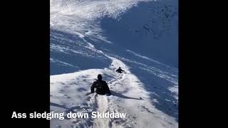 Ass Sledging Down Skiddaw To Carlside. Wainwrights, Lake District