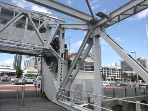 Rolling lift bridge