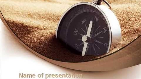 Compass in Sand PowerPoint Template by PoweredTemplate.com