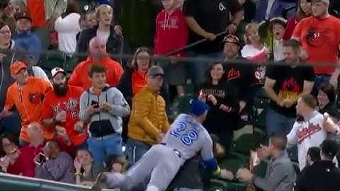 Steve Pearce launches into the stands to make an incredible diving catch