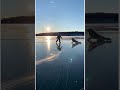 A Solitary Figure on a Vast Frozen Lake.