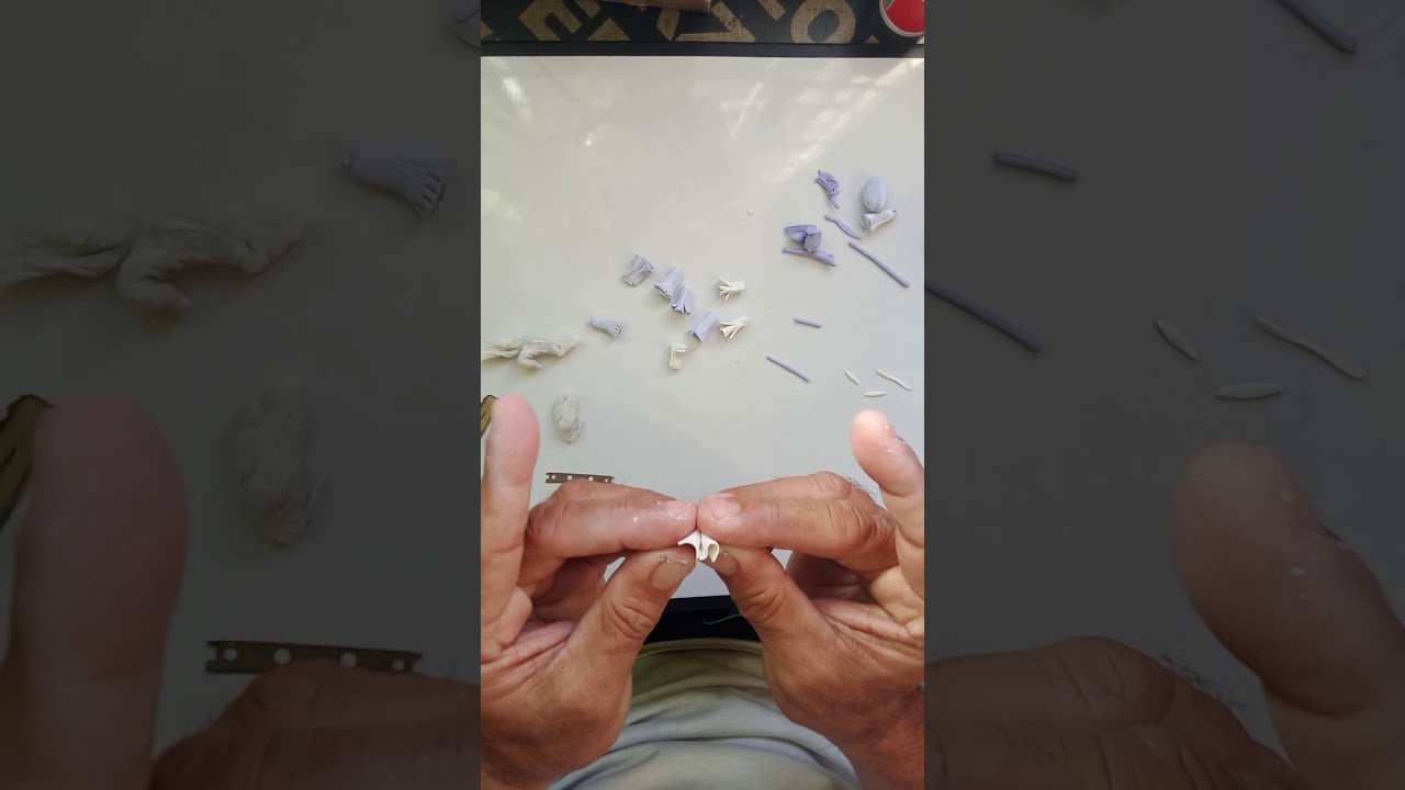 How to make flower' Carnation' earring, made of clay.