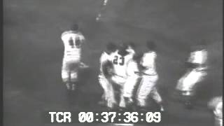 Hank Aaron smacks a home run to clinch the Pennant for the Milwaukee Braves 1957