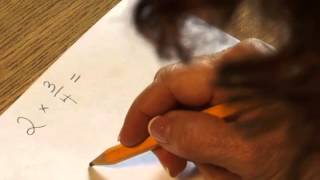 Multiplication by a Fraction on Paper (Montessori Elementary Math)