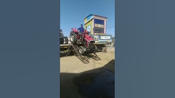 Tractor unloading with the help of Ramp | #shorts | Unloading process | Vehicle unloading
