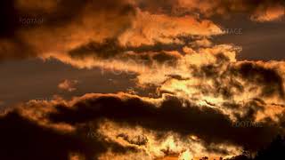 Sun Hiding Behind the Clouds at Sunset