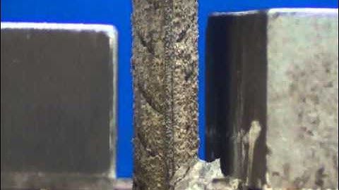 A Pull Out Test on a Short Ribbed Reinforcement Bar Embedded into Concrete