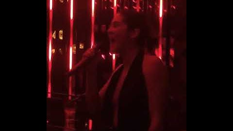 Isabelle Fuhrman singing in the bar