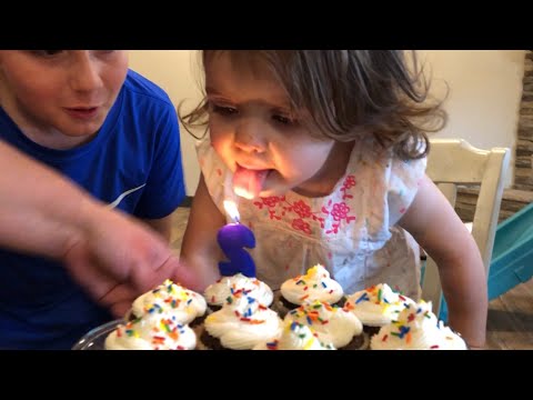 baby-tries-to-put-out-birthday-cake-candle-with-her-tongue---stopped-her-just-in-time!