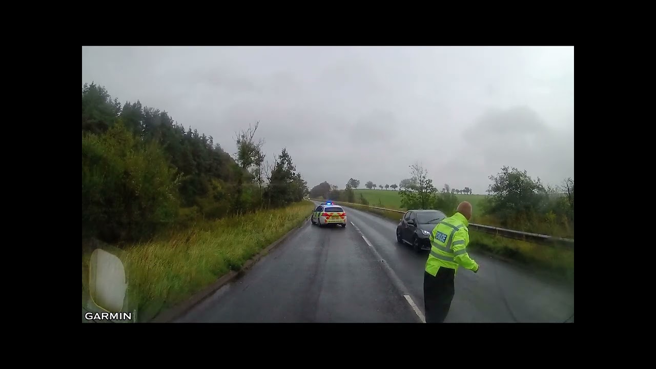 British Bobby playing “Pat i cake, Patt i cake, Bakersman…, but then “You can’t park there!”