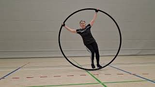 CYR Spin-B 4. Partial jump landing on wheel optional body/leg position