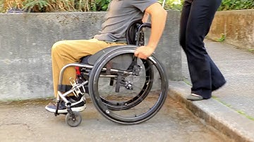 Curbs and Steps: SCI Empowerment Project Wheelchair Skills Video 11