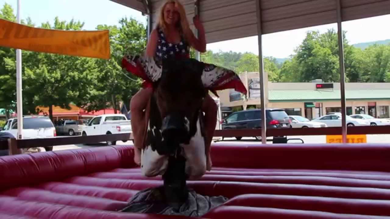 Hot Cowgirl riding a mechanical bull - YouTube