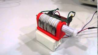 Continuous rotary minimotor based on shape memory wires - Sequential activation