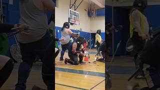 Shooting a bow with a Separ in hand in combat archery.