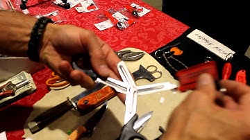 Handy Sharp = Chad sharpens a pair of EMS scissors