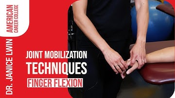 ACC PTA Instructors Demonstrate Joint Mobilization Techniques For Finger Flexion