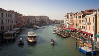 Panning timelapse shot across the Grand Canal near the Rialto Bridge, Venice