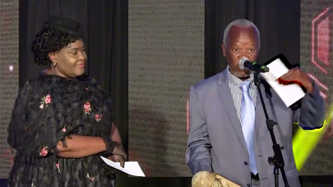 Pastor Derrick Ndzimande receiving award