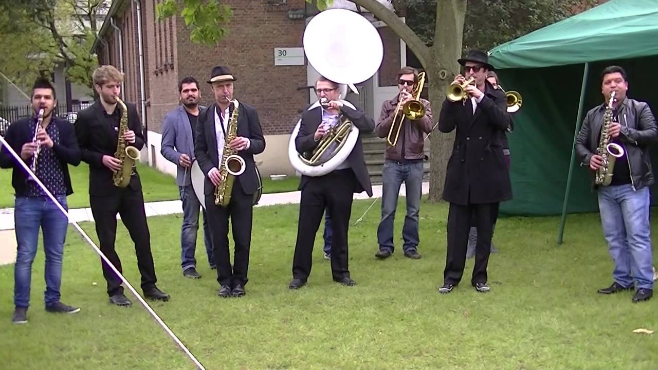 ambrassband playing "moliendo café"