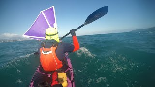 Downwind run along Kapiti coast, paddling and sailing