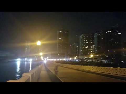 Riding my bike through the venetian causeway at night, Miami skyline.