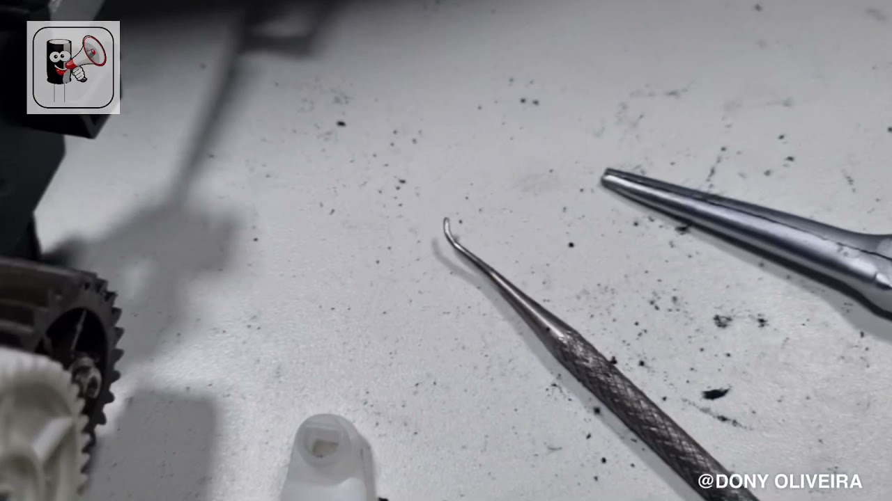 Troca da película do fusor da impressora brother