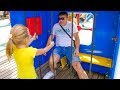 Nastya and dad play fun at the amusement park