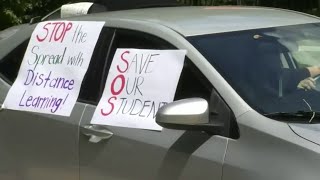 School districts react to order to reopen in August