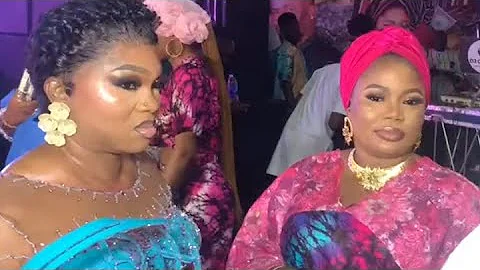 BETWEEN REGINA CHUKWU AND SEYI EDUN AT THE PREMIERE OF "OWAMBE THIEVES"