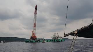 種子島沖に沈む旧日本海軍の九七艦攻。主翼とみられる部品が海底から引き揚げられる瞬間。2021年6月24日