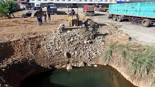 For today—regarding the pond-filling operation: Komatsu D31P dozer and 5-ton truck are being used.