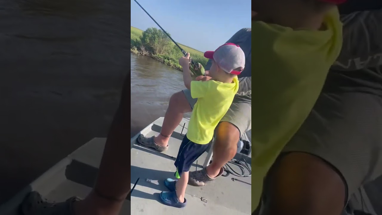 Baby Boy caught his first redfish ever on his brand new camo fishing pole. 