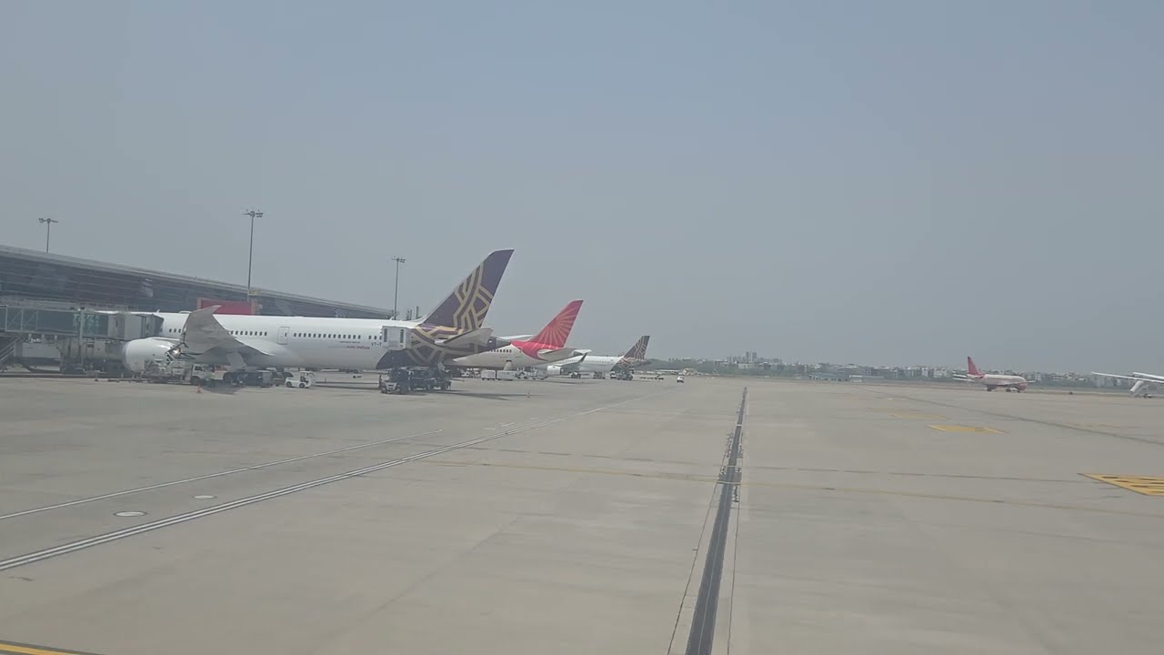 DEL - SGN - Air India - Pushback, taxi, takeoff on a hazy afternoon from Delhi, India - May 2025