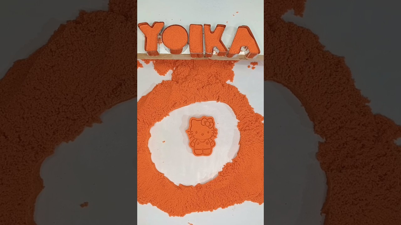 Make hello Kitty from orange kinetic sand 1 