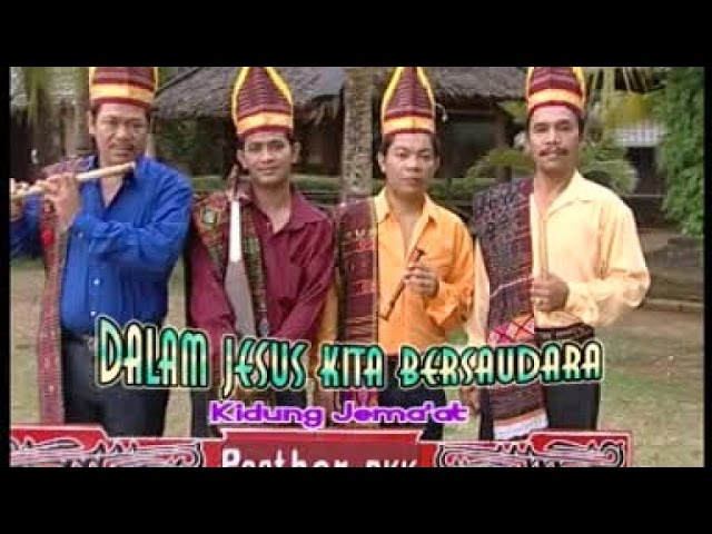 Posther Sihotang, dkk - Dalam Yesus Kita Bersaudara (Official Music Video) class=
