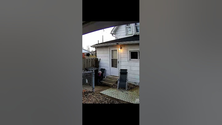 Elderly Woman Falls Backward While Unlocking Door - 1277348