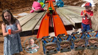 Monster Jam Mystery Mudders & Super Slippy Water Slide! How wet can they get & reveal the colour?
